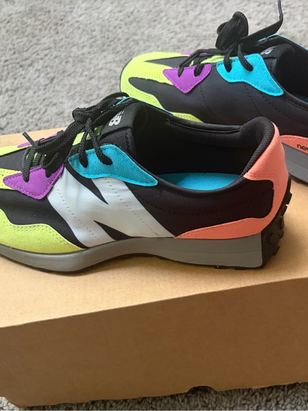 New Balance Black Sneakers with Neon Yellow, Teal, Purple, and Coral Accents